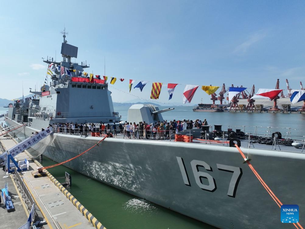 This aerial drone photo shows visitors on the naval vessel Shenzhen during an open day activity at a port in Shenzhen of south China's Guangdong Province, Oct. 1, 2024. (Photo: Xinhua)