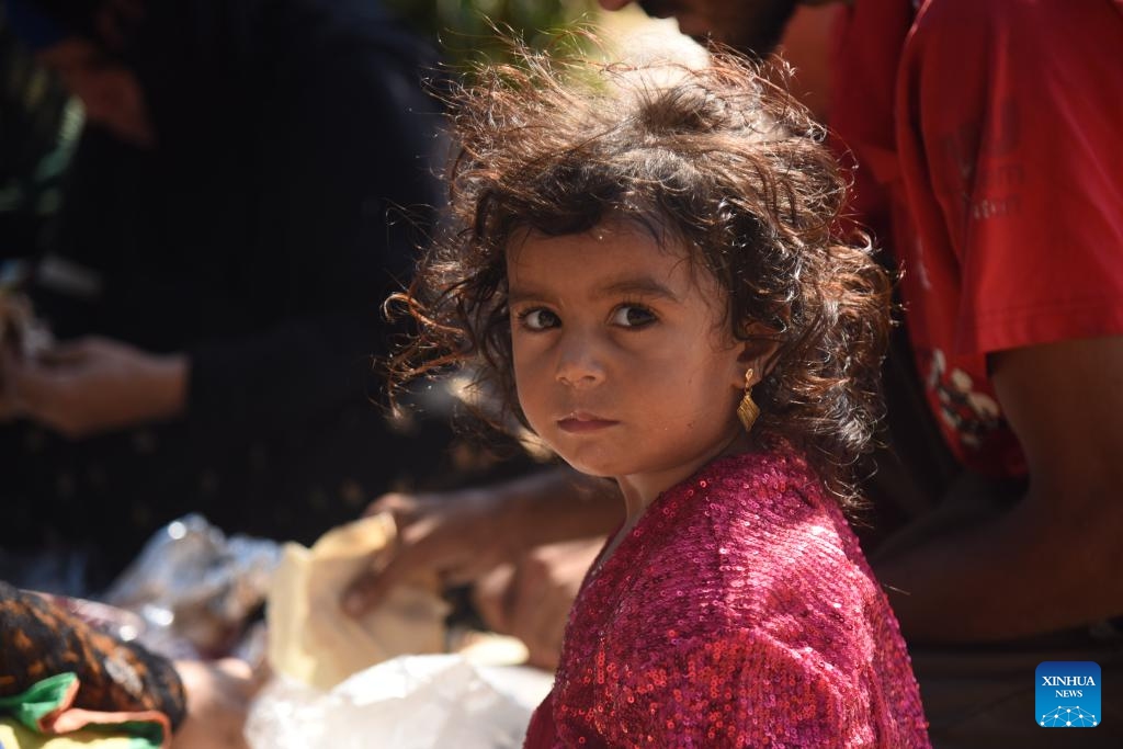 This photo taken on Sept. 28, 2024 shows a displaced girl from the southern suburbs of Beirut due to Israeli airstrikes in Tripoli, Lebanon. (Photo: Xinhua)