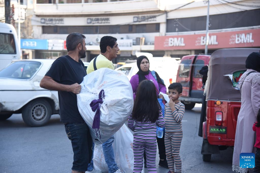 This photo taken on Sept. 28, 2024 shows displaced people from the southern suburbs of Beirut due to Israeli airstrikes in Tripoli, Lebanon. (Photo: Xinhua)