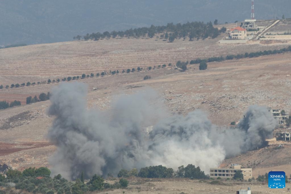 This photo taken on Sept. 28, 2024 shows smoke rising following an Israeli airstrike in Khiam, Lebanon. Israeli warplanes launched a series of air raids on Hezbollah sites and towns and villages in southern and eastern Lebanon early Saturday morning, said Lebanese military sources. (Photo: Xinhua)