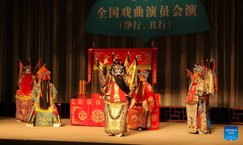 Wang Wei (C), an actor of Liuzi Opera from Shandong Province, performs the role of General Zhang Fei, who is a famous character from the classic Chinese novel The Romance of the Three Kingdoms, during the annual Chinese Opera Gala (Kunshan) at a Kunqu theater in Kunshan City, east China's Jiangsu Province, Sept. 9, 2024. (Photo: Xinhua)