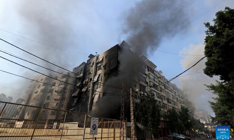 This photo shows a damaged building after Israeli airstrikes in the southern suburbs of Beirut, Lebanon, Sept. 28, 2024. (Photo: Xinhua)