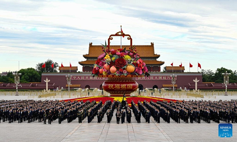 A ceremony presenting flower baskets to fallen heroes to mark Martyrs' Day is held at Tian'anmen Square in Beijing, capital of China, Sept. 30, 2024. (Photo: Xinhua)