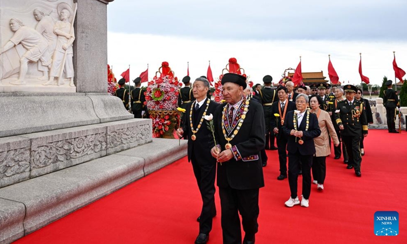 A ceremony presenting flower baskets to fallen heroes to mark Martyrs' Day is held at Tian'anmen Square in Beijing, capital of China, Sept. 30, 2024. (Photo: Xinhua)