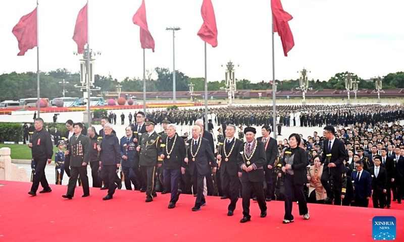 A ceremony presenting flower baskets to fallen heroes to mark Martyrs' Day is held at Tian'anmen Square in Beijing, capital of China, Sept. 30, 2024. (Photo: Xinhua)