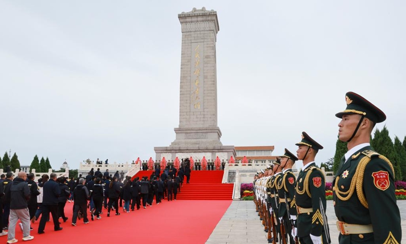 A ceremony presenting flower baskets to fallen heroes to mark Martyrs' Day is held at Tian'anmen Square in Beijing, capital of China, Sept. 30, 2024. (Photo: Xinhua)