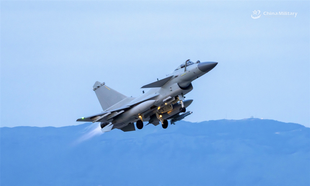 A fighter jet attached to an aviation brigade under the Chinese PLA Air Force takes off for a flight training exercise in late July, 2024. (eng.chinamil.com.cn/Photo by Hou Kaiwen)