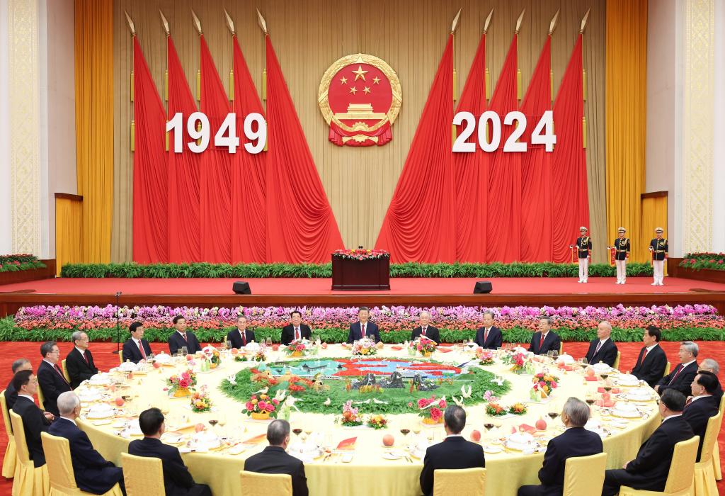 The Communist Party of China and state leaders Xi Jinping, Li Qiang, Zhao Leji, Wang Huning, Cai Qi, Ding Xuexiang, Li Xi and Han Zheng attend a reception to celebrate the 75th anniversary of the founding of the People's Republic of China together with around 3,000 Chinese and foreign guests at the Great Hall of the People in Beijing, capital of China, Sept. 30, 2024. Photo: Xinhua