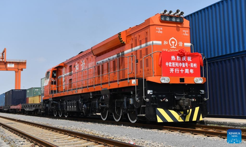 A China-Europe freight train is pictured at Putian Station in Zhengzhou, capital of central China's Henan Province, July 18, 2023. Strategically positioned in central part of the country, Henan has been serving as a national hub of transporation for ages. The past decades saw the province building a modern transportation network consisting air flights, railways, highways, water channels and all sorts of ports. It is now rapidly extending its role to areas of cross-border logistics, investment, and trade to facilitate the dual circulation of domestic and international markets. Photo: Xinhua