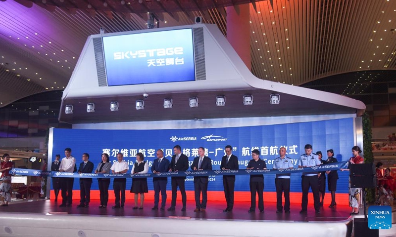 Guests cut the ribbon at a ceremony marking the opening of the Belgrade-Guangzhou route of Air Serbia at the Guangzhou Baiyun International Airport in Guangzhou, south China's Guangdong Province, Sept. 30, 2024. Photo: Xinhua