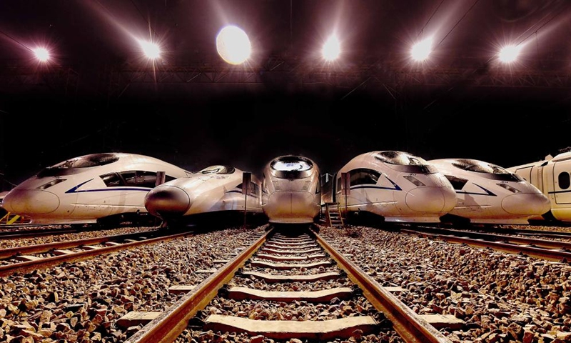 This photo shows bullet trains parked at a train depot in Zhengzhou, central China's Henan Province, Sept. 6, 2016. Strategically positioned in central part of the country, Henan has been serving as a national hub of transporation for ages. The past decades saw the province building a modern transportation network consisting air flights, railways, highways, water channels and all sorts of ports. It is now rapidly extending its role to areas of cross-border logistics, investment, and trade to facilitate the dual circulation of domestic and international markets. Photo: Xinhua