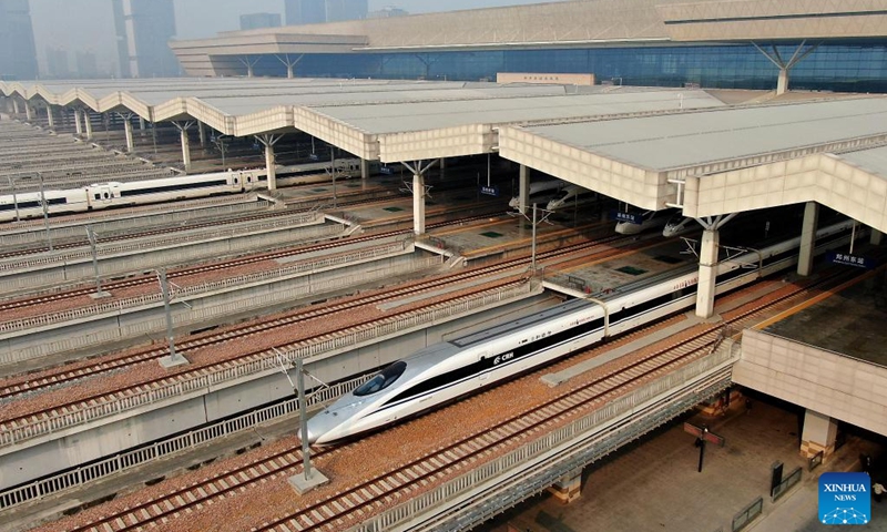 A bullet train departs from Zhengzhou East Railway Station in Zhengzhou, central China's Henan Province, Dec. 1, 2019. Strategically positioned in central part of the country, Henan has been serving as a national hub of transporation for ages. The past decades saw the province building a modern transportation network consisting air flights, railways, highways, water channels and all sorts of ports. It is now rapidly extending its role to areas of cross-border logistics, investment, and trade to facilitate the dual circulation of domestic and international markets. Photo: Xinhua