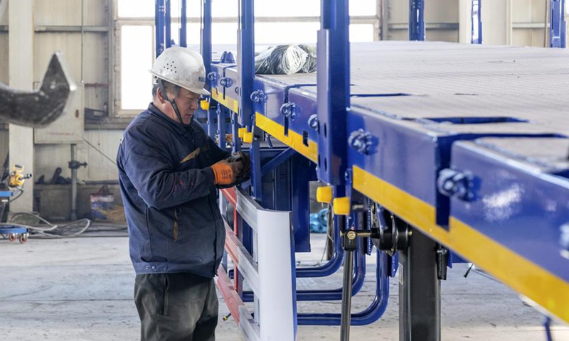 A staff member works at a workshop in the Heihe Area of China (Heilongjiang) Pilot Free Trade Zone in Heihe, northeast China's Heilongjiang Province, Jan. 31, 2024. (Xinhua/Xie Jianfei)