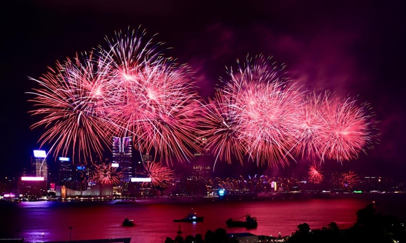 Fireworks celebrating the 75th anniversary of the founding of the People's Republic of China illuminate the sky over Victoria Harbour in Hong Kong,<strong></strong> south China, Oct. 1, 2024. (Xinhua/Zhu Wei)