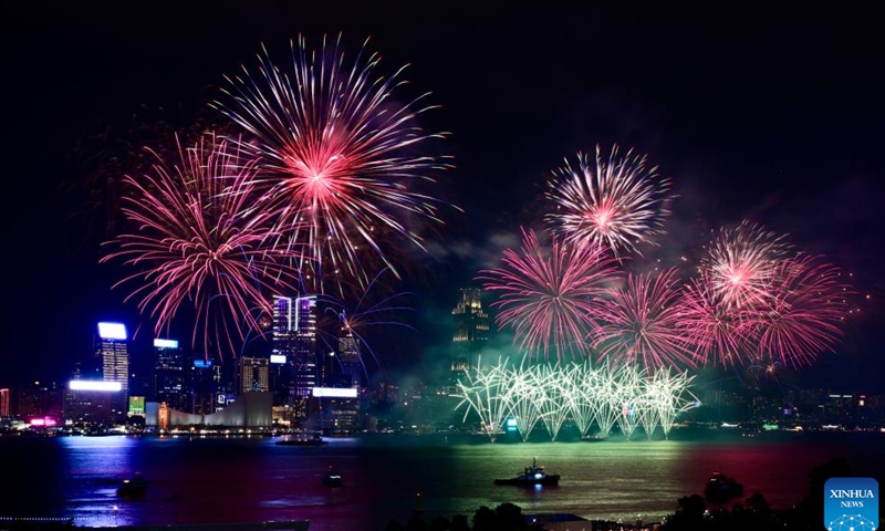 Fireworks celebrating the 75th anniversary of the founding of the People's Republic of China illuminate the sky over Victoria Harbour in Hong Kong, south China, Oct. 1, 2024. (Xinhua/Zhu Wei)