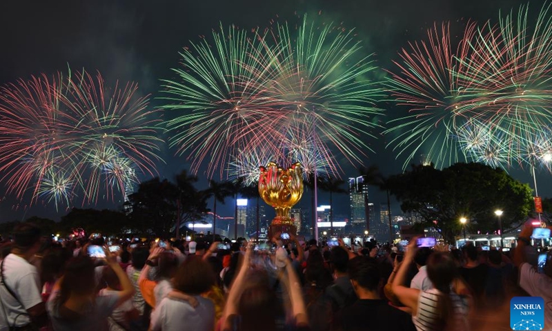 Fireworks celebrating the 75th anniversary of the founding of the People's Republic of China illuminate the sky over Victoria Harbour in Hong Kong, south China, Oct. 1, 2024. (Xinhua/Chen Duo)