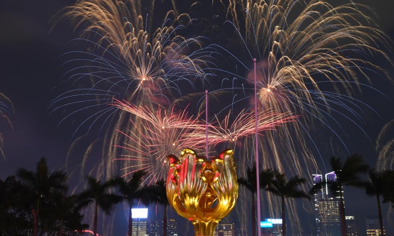 Fireworks celebrating the 75th anniversary of the founding of the People's Republic of China illuminate the sky over Victoria Harbour in Hong Kong, south China, Oct. 1, 2024. (Xinhua/Chen Duo)