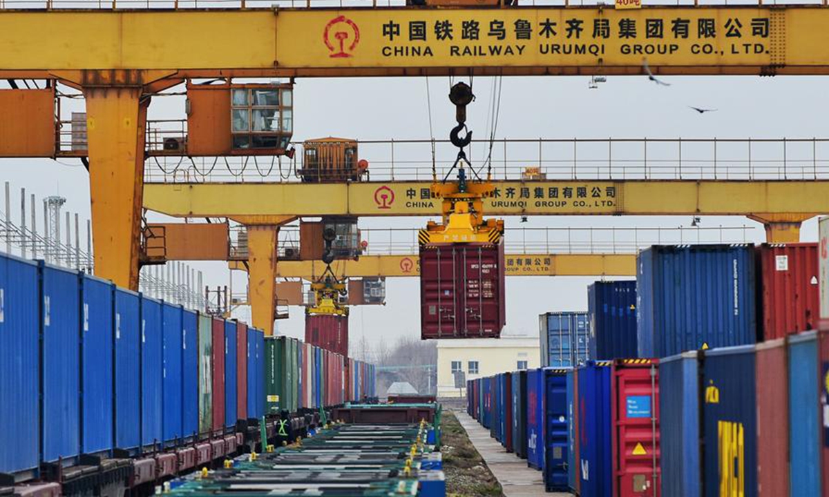 A container of China-Europe freight train is lifted at Horgos Port in Horgos, northwest China's Xinjiang Uygur Autonomous Region, Jan. 15, 2024. (Photo by Bai Fengliang/Xinhua)