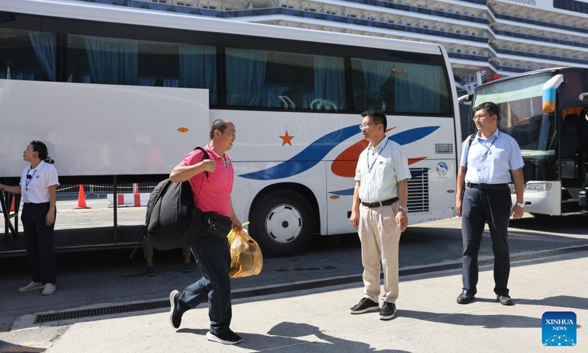 Staff of the Chinese Embassy in Cyprus welcome Chinese citizens evacuated from Lebanon at the Port of Limassol, Cyprus, on Oct. 1, 2024. (Xinhua/Li Jing)
