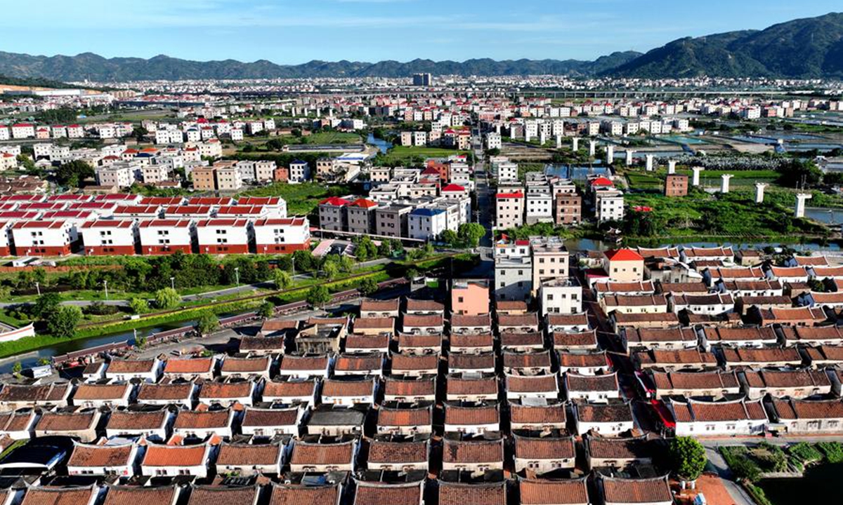 An aerial drone photo taken on July 10, 2024 shows a view of Daimei Village in Longhai District of Zhangzhou City, southeast China's Fujian Province. (Xinhua/Wei Peiquan)