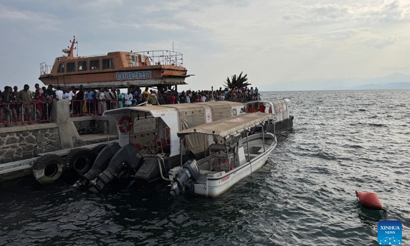 People gather at a port after a ferry sank on Lake Kivu near Goma, North Kivu province, eastern Democratic Republic of the Congo (DRC), on Oct. 3, 2024. At least 87 people were killed Thursday after a ferry sank on Lake Kivu in the eastern Democratic Republic of the Congo (DRC), according to a report by local authorities seen by Xinhua. (Xinhua/Alain Uaykani)