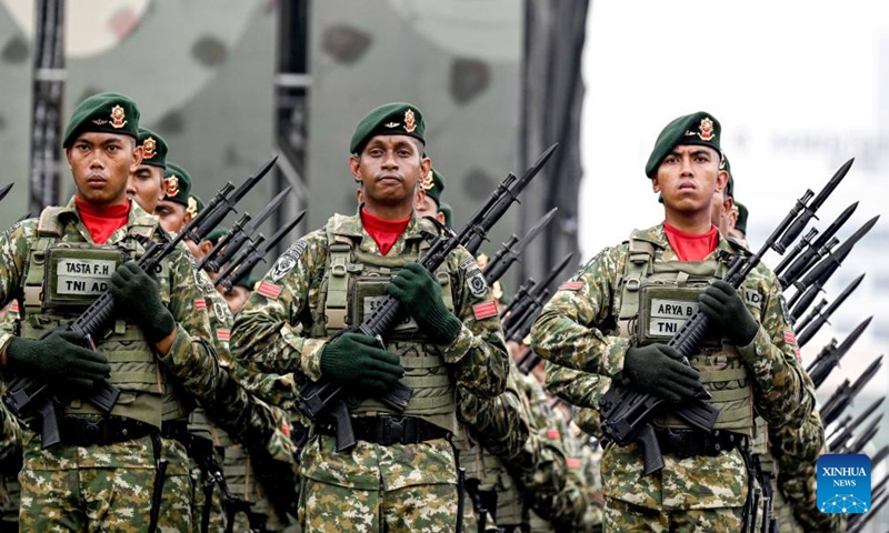 The Indonesian National Army (TNI) participate in a military parade rehearsal of the 79th anniversary of the TNI at Monument National in Jakarta, Indonesia, on Oct. 3, 2024. The TNI will showcase over 1,000 military assets from the Army, Navy, and Air Force during its 79th anniversary celebrations on Oct. 5. (Xinhua/Agung Kuncahya B.)