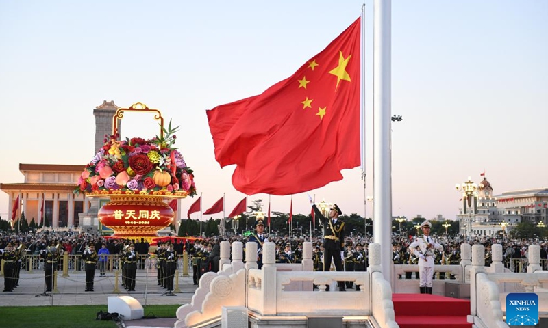 A flag-raising ceremony marking the 75th anniversary of the founding of the People's Republic of China is held at the Tian'anmen Square in Beijing, capital of China, Oct. 1, 2024. (Xinhua/Chen Zhonghao)