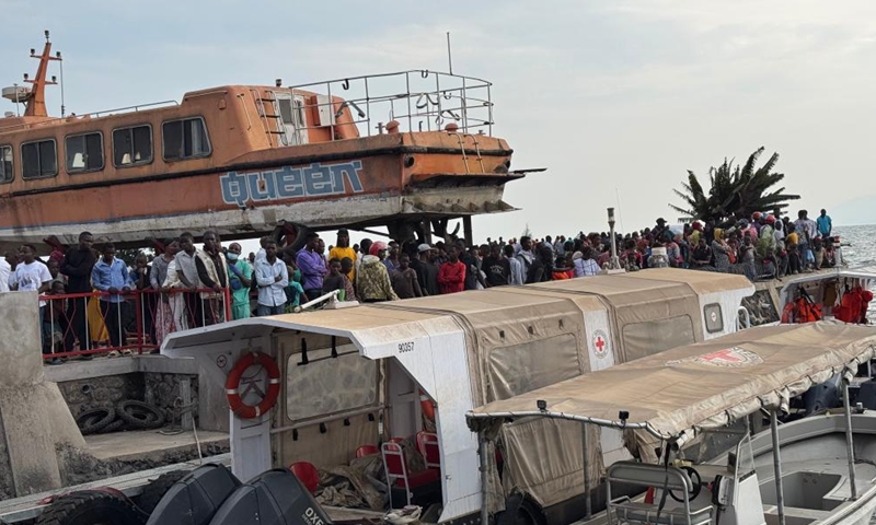 People gather at a port after a ferry sank on Lake Kivu near Goma, North Kivu province, eastern Democratic Republic of the Congo (DRC), on Oct. 3, 2024. At least 87 people were killed Thursday after a ferry sank on Lake Kivu in the eastern Democratic Republic of the Congo (DRC), according to a report by local authorities seen by Xinhua. (Xinhua/Alain Uaykani)