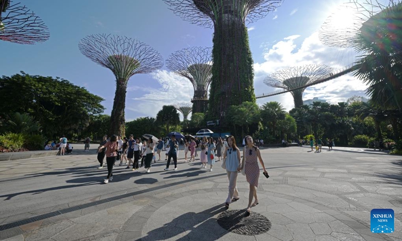 Tourists visit the Supertree Grove at Singapore's Gardens by the Bay on Oct. 3, 2024. (Photo by Then Chih Wey/Xinhua)