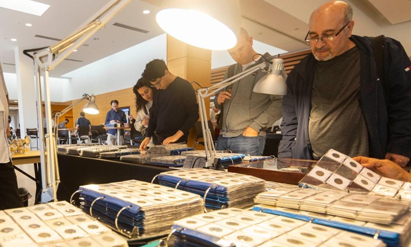 People view collections of coins during the 2024 Toronto Coin Expo in Toronto, Canada, on Oct. 4, 2024. Featuring over 40 coin & banknote dealers, the two-day event kicked off here on Friday. (Photo by Zou Zheng/Xinhua)