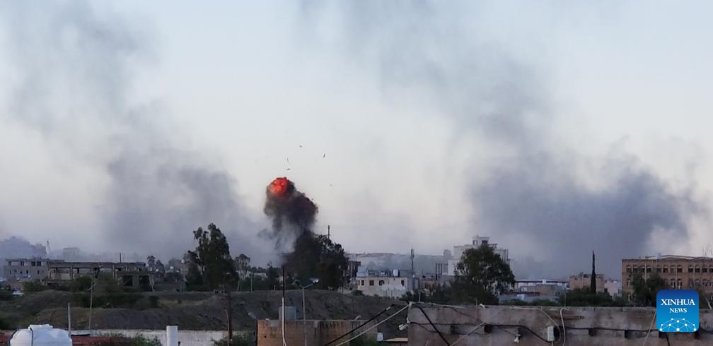 This photo taken by cell phone shows smoke rising following airstrikes in Sanaa, Yemen, Oct. 4, 2024. The United States Central Command (CENTCOM) said on Friday its forces conducted airstrikes on 15 targets in Houthi-controlled areas of Yemen. (Photo by Mohammed Azaki/Xinhua)