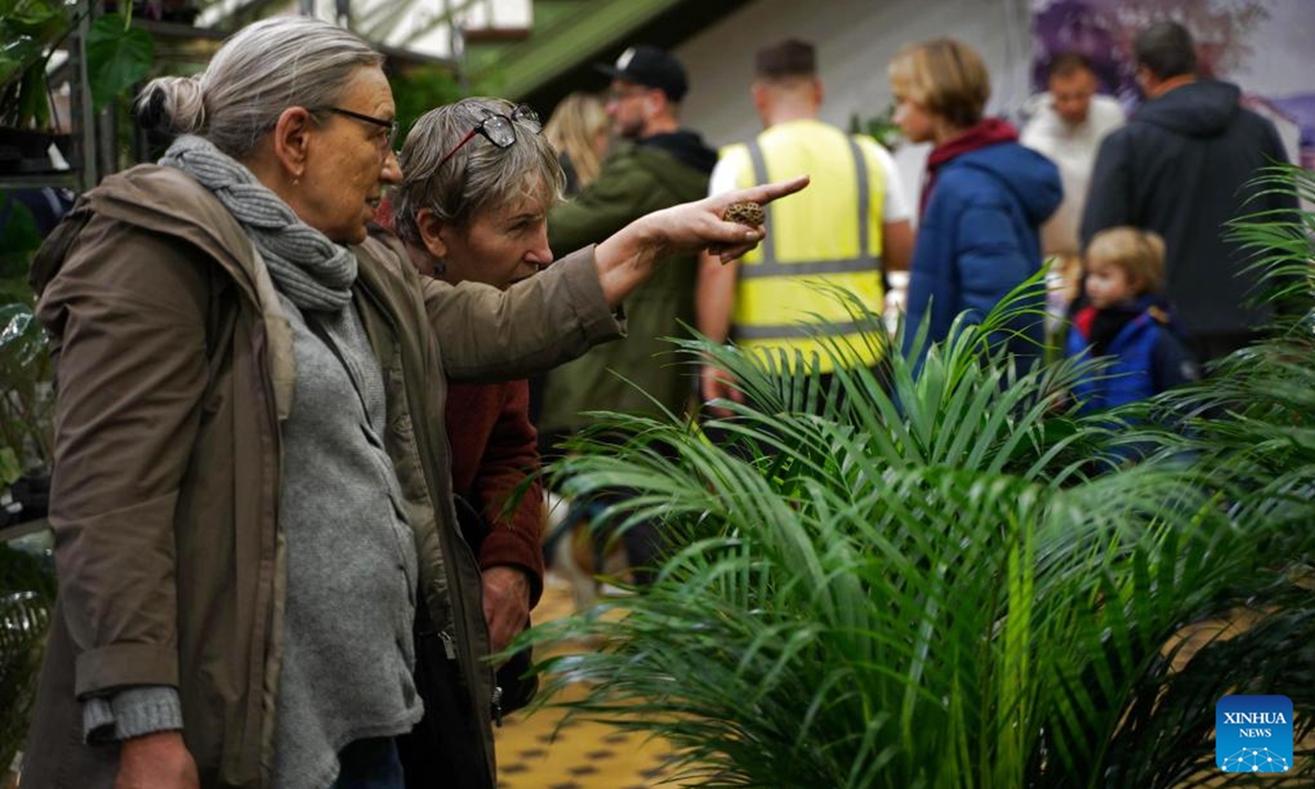 People visit the 6th Plant Festival in Lodz, Poland, Oct. 5, 2024. The two-day event kicked off here on Saturday, featuring direct sales from growers, showcasing household plants, gardening accessories, and eco-friendly products. (Photo: Xinhua)