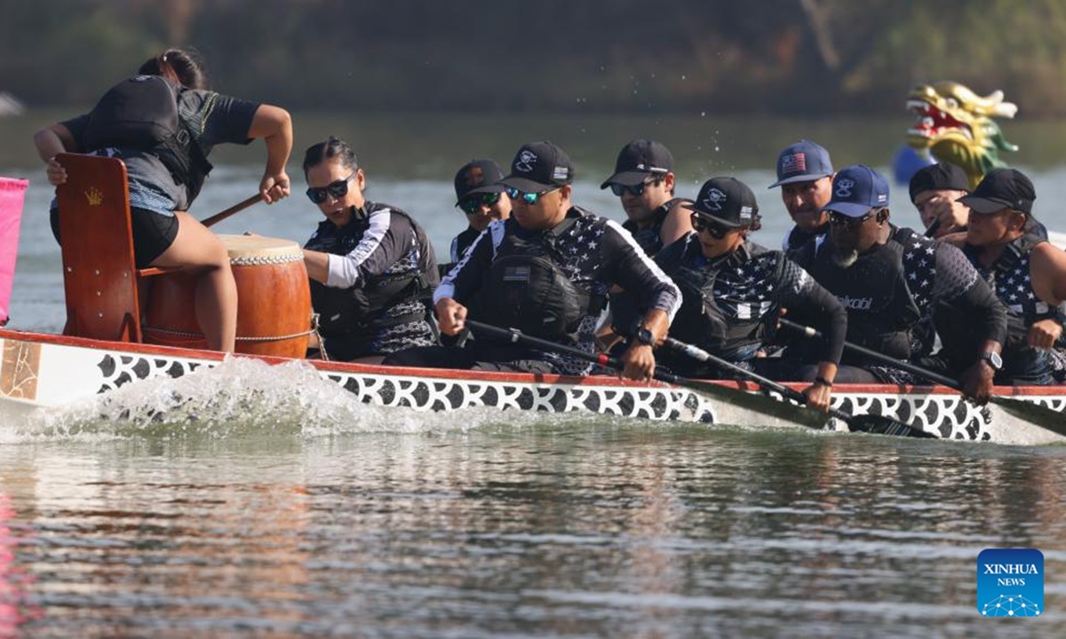 People participate in the Los Angeles Dragon Boat Festival in Los Angeles, California, the United States, Oct. 5, 2024. Over a hundred teams from all over the United States participated in the annual dragon boat races.  (Photo: Xinhua)