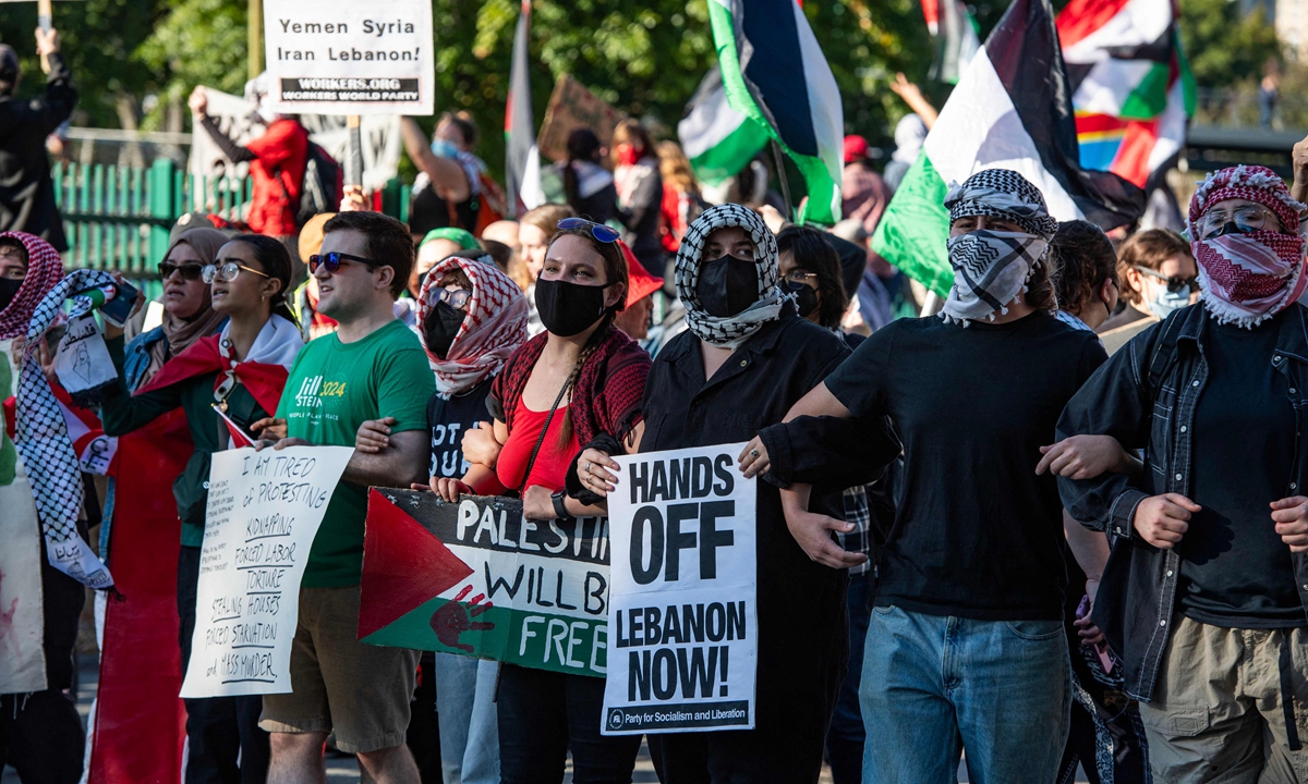 Pro-Palestinian demonstrators march during a rally to mark one year of the Israel-Palestine conflict in Boston, Massachusetts on October 6, 2024. Photo: AFP