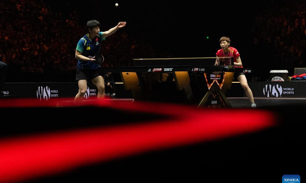 Sun Yingsha (L) of China serves during the women's singles final match against Wang Manyu of China at 2024 World Table Tennis (WTT) China Smash in Beijing, China, Oct. 6, 2024. (Photo: Xinhua)