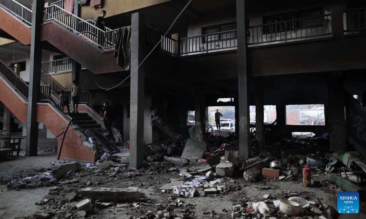 This photo taken on Oct. 6, 2024 shows a view of a school sheltering displaced people after it was attacked by the Israeli army in the city of Deir al-Balah in central Gaza Strip. At least 24 Palestinians were killed and 93 others wounded during Israel's bombing of a mosque and a school in the central Gaza Strip on Sunday, media reports said. (Photo: Xinhua)