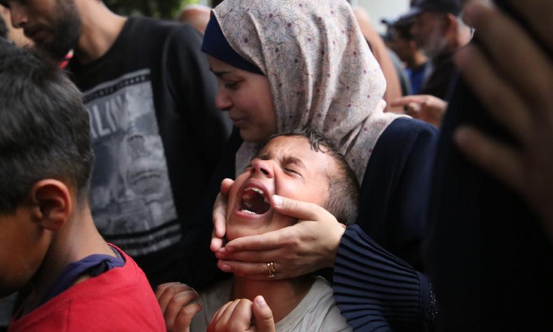 Grieved people are pictured at a hospital in the southern Gaza Strip city of Rafah, on April 1, 2024. (Photo by Khaled Omar/Xinhua)