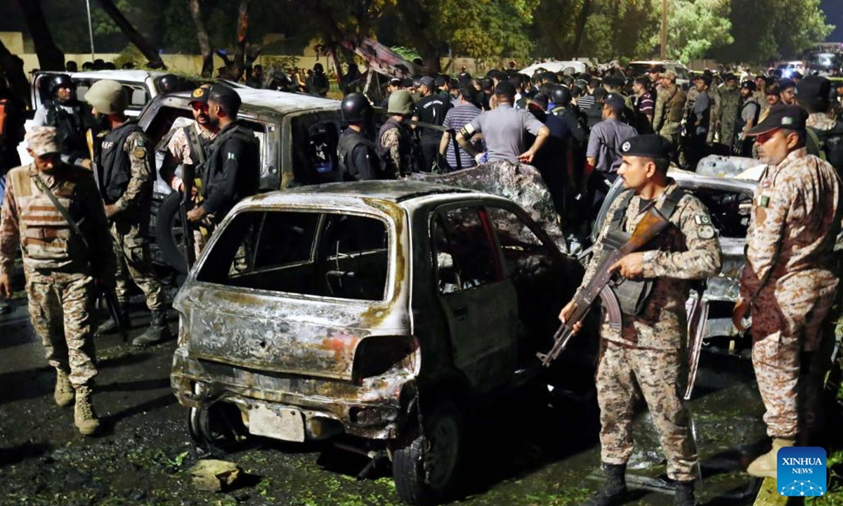 This photo taken on Oct. 7, 2024 shows destroyed cars at the site of a terrorist attack near Jinnah International Airport in Karachi, the capital city of Pakistan's south Sindh province. Two Chinese nationals were killed, one Chinese national injured, and several Pakistani nationals were killed and injured in a terrorist attack in Pakistan's southern port city of Karachi on Sunday night, the Chinese embassy in Pakistan confirmed.  (Photo: Xinhua)