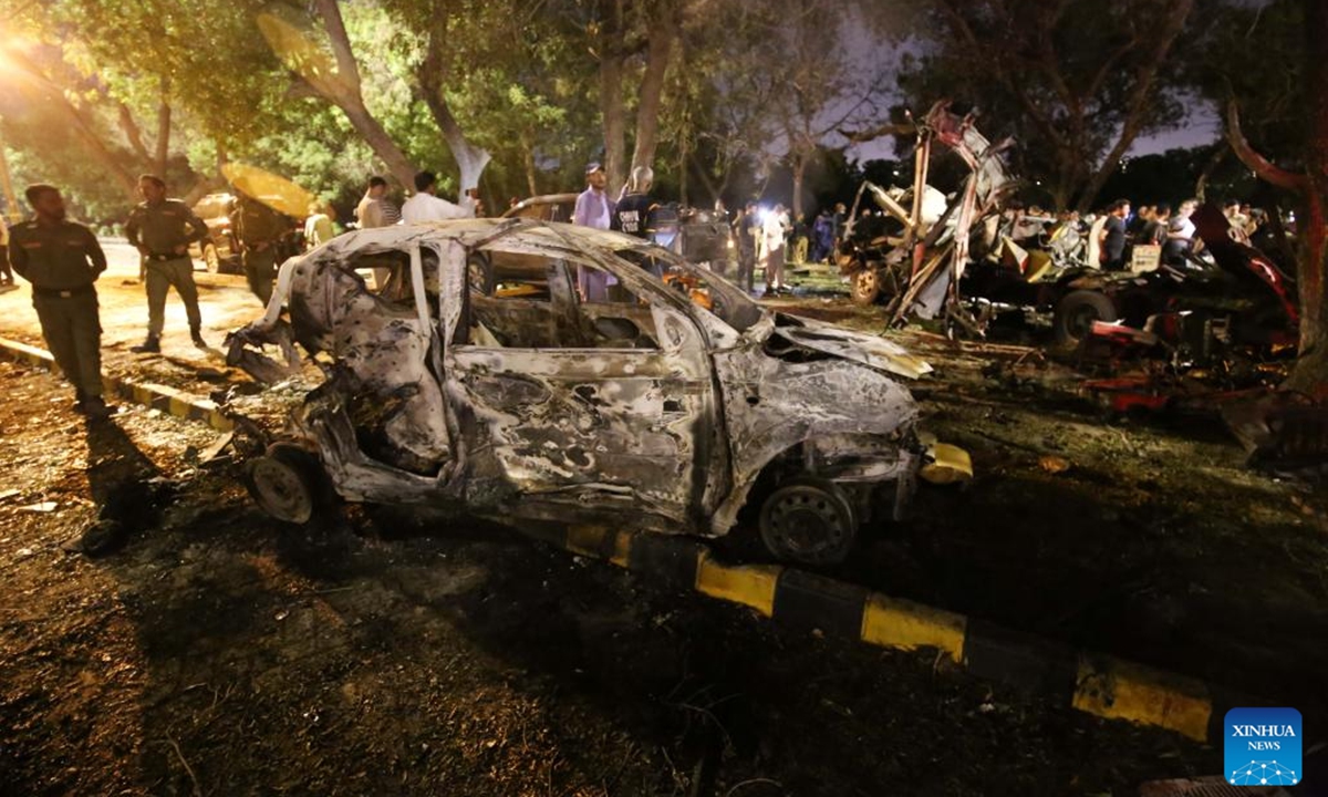 This photo taken on Oct. 7, 2024 shows destroyed cars at the site of a terrorist attack near Jinnah International Airport in Karachi, the capital city of Pakistan's south Sindh province. Two Chinese nationals were killed, one Chinese national injured, and several Pakistani nationals were killed and injured in a terrorist attack in Pakistan's southern port city of Karachi on Sunday night, the Chinese embassy in Pakistan confirmed.  (Photo: Xinhua)