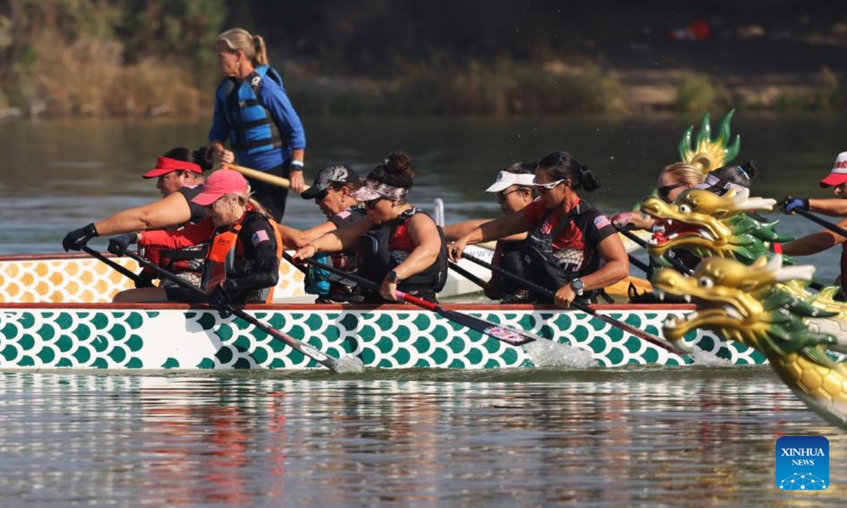 People participate in the Los Angeles Dragon Boat Festival in Los Angeles, California, the United States, Oct. 5, 2024. Over a hundred teams from all over the United States participated in the annual dragon boat races.  (Photo: Xinhua)