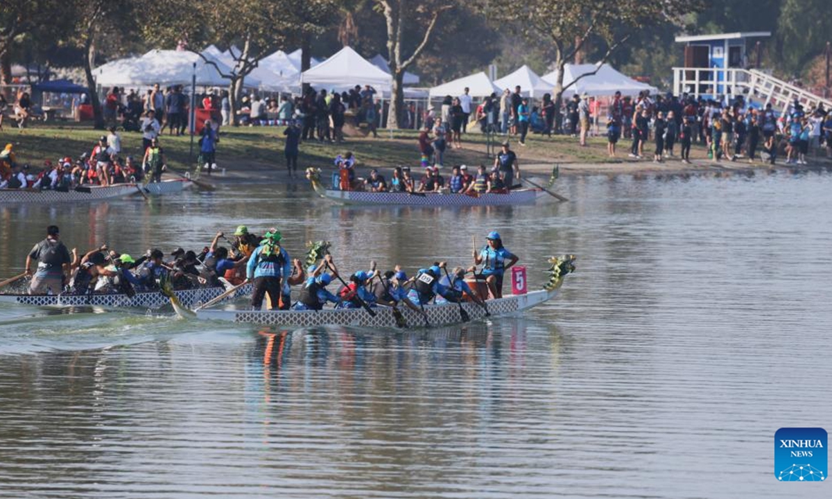 People participate in the Los Angeles Dragon Boat Festival in Los Angeles, California, the United States, Oct. 5, 2024. Over a hundred teams from all over the United States participated in the annual dragon boat races.  (Photo: Xinhua)