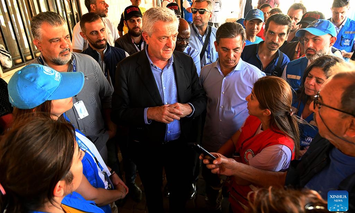 United Nations High Commissioner for Refugees (UNHCR) Filippo Grandi (C) visits the Jdeidet Yabous crossing between Syria and Lebanon, on Oct. 7, 2024. Grandi visited the Jdeidet Yabous crossing on the border between Syria and Lebanon on Monday, Syria's state news agency SANA reported. Grandi said Monday on the social media platform X that more than 1.2 million people have currently been displaced in Lebanon. (Photo: Xinhua)