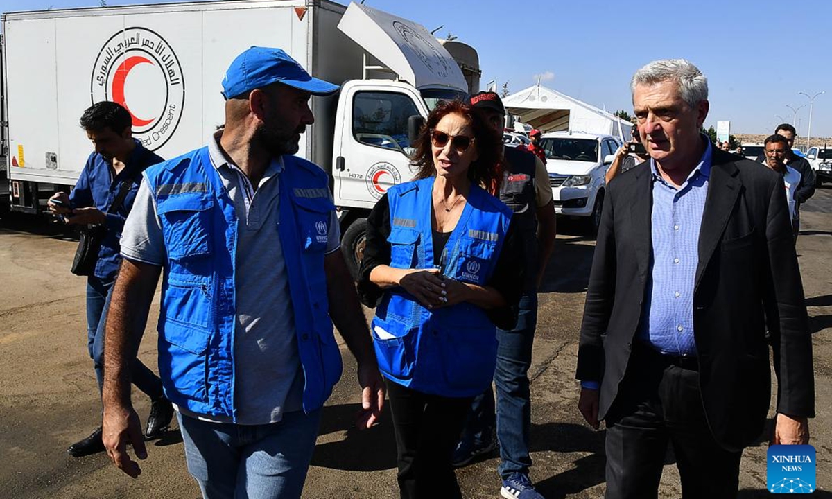 United Nations High Commissioner for Refugees (UNHCR) Filippo Grandi (1st R, Front) visits the Jdeidet Yabous crossing between Syria and Lebanon, on Oct. 7, 2024. Grandi visited the Jdeidet Yabous crossing on the border between Syria and Lebanon on Monday, Syria's state news agency SANA reported. Grandi said Monday on the social media platform X that more than 1.2 million people have currently been displaced in Lebanon. (Photo: Xinhua)