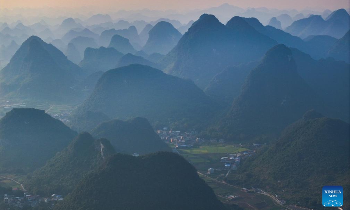 This aerial drone photo taken on Oct. 7, 2024 shows the autumn scenery of a village in Sandu Town of Liujiang District, Liuzhou City, south China's Guangxi Zhuang Autonomous Region. (Photo: Xinhua)