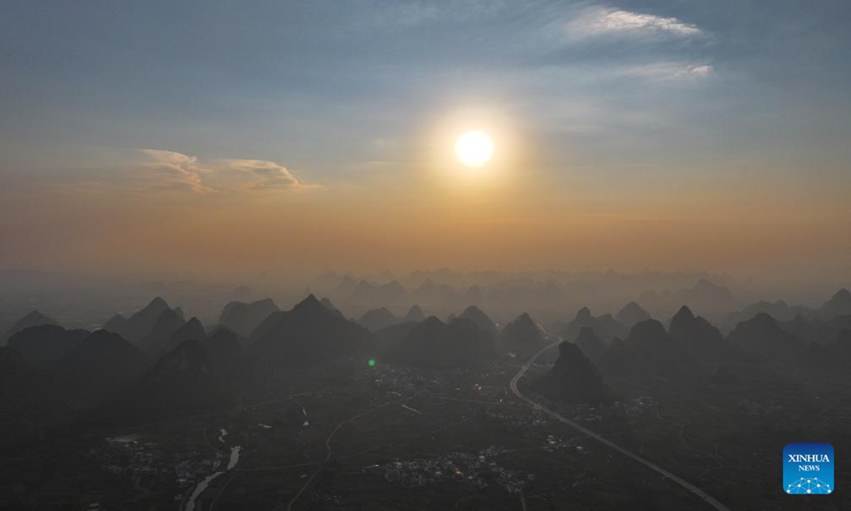 This aerial drone photo taken on Oct. 7, 2024 shows the autumn scenery of a village in Sandu Town of Liujiang District, Liuzhou City, south China's Guangxi Zhuang Autonomous Region. (Photo: Xinhua)