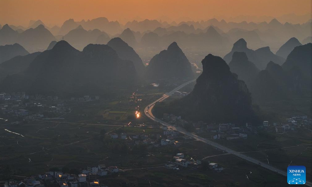 This aerial drone photo taken on Oct. 7, 2024 shows the autumn scenery of a village in Sandu Town of Liujiang District, Liuzhou City, south China's Guangxi Zhuang Autonomous Region. (Photo: Xinhua)