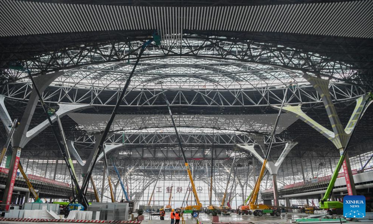 This photo taken on Oct. 6, 2024 shows the construction site of Chongqing East Railway Station and affiliated comprehensive transportation hub in southwest China's Chongqing. Workers are busy constructing the Chongqing East Railway Station during the National Day holiday as the station is expected to start operation in 2025. (Photo: Xinhua)