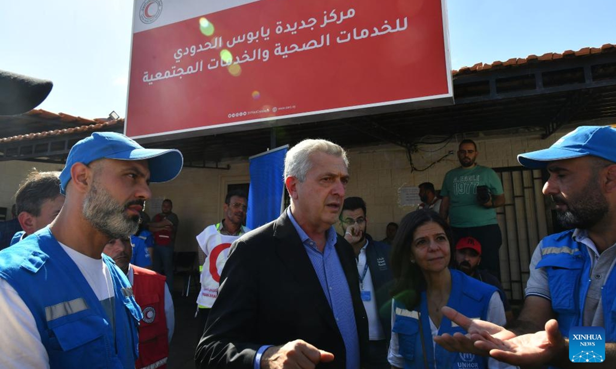 United Nations High Commissioner for Refugees (UNHCR) Filippo Grandi (C) visits the Jdeidet Yabous crossing between Syria and Lebanon, on Oct. 7, 2024. Grandi visited the Jdeidet Yabous crossing on the border between Syria and Lebanon on Monday, Syria's state news agency SANA reported. Grandi said Monday on the social media platform X that more than 1.2 million people have currently been displaced in Lebanon. (Photo: Xinhua)