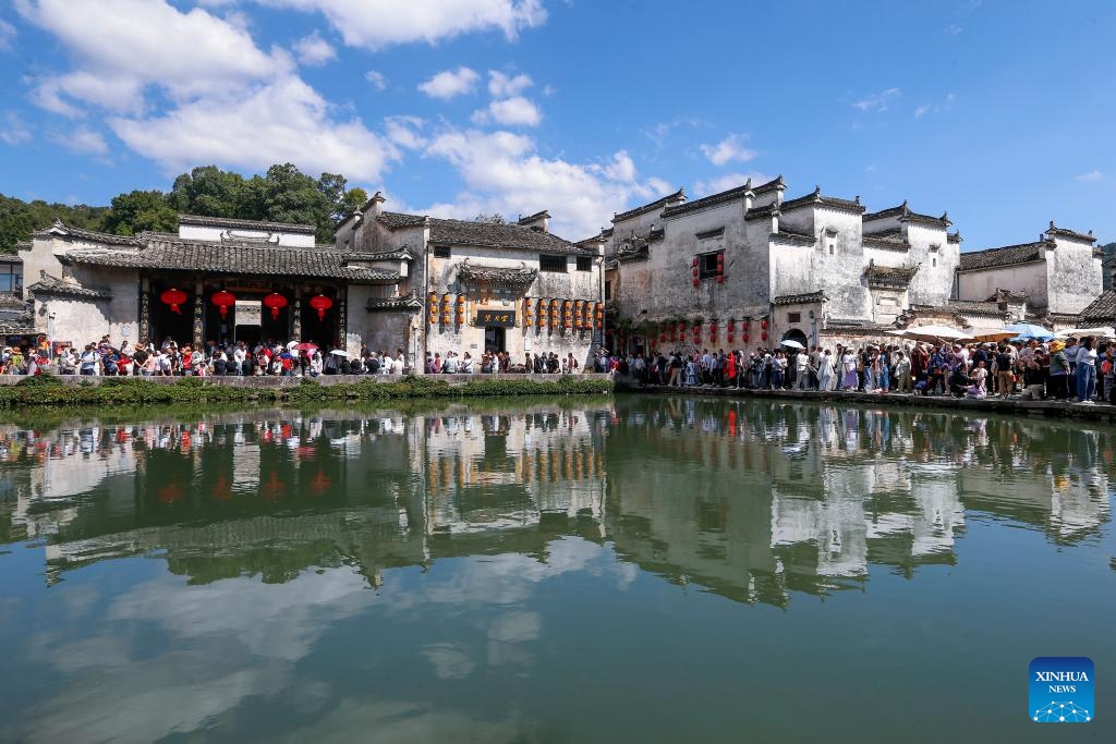 Tourists visit Hongcun Village of Yixian County, east China's Anhui Province,Oct. 3, 2024. China recorded 765 million domestic tourist trips during the 7-day National Day holiday that ended Monday, representing a year-on-year increase of 5.9 percent on a comparable basis, according to data from the Ministry of Culture and Tourism (Photo: Xinhua)