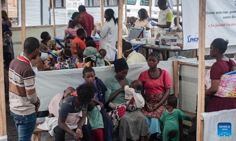 People wait to get vaccinated at a vaccination center near a camp for internally displaced persons in Goma, North Kivu Province, the Democratic Republic of the Congo (DRC), on Oct. 9, 2024. Around 940,000 people have been displaced this year in the Democratic Republic of the Congo (DRC), UN High Commissioner for Human Rights Volker Turk said on Tuesday. (Photo: Xinhua)